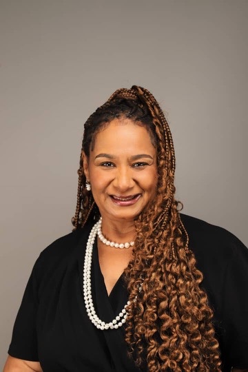 Dr. Delia Gillis - Board Member